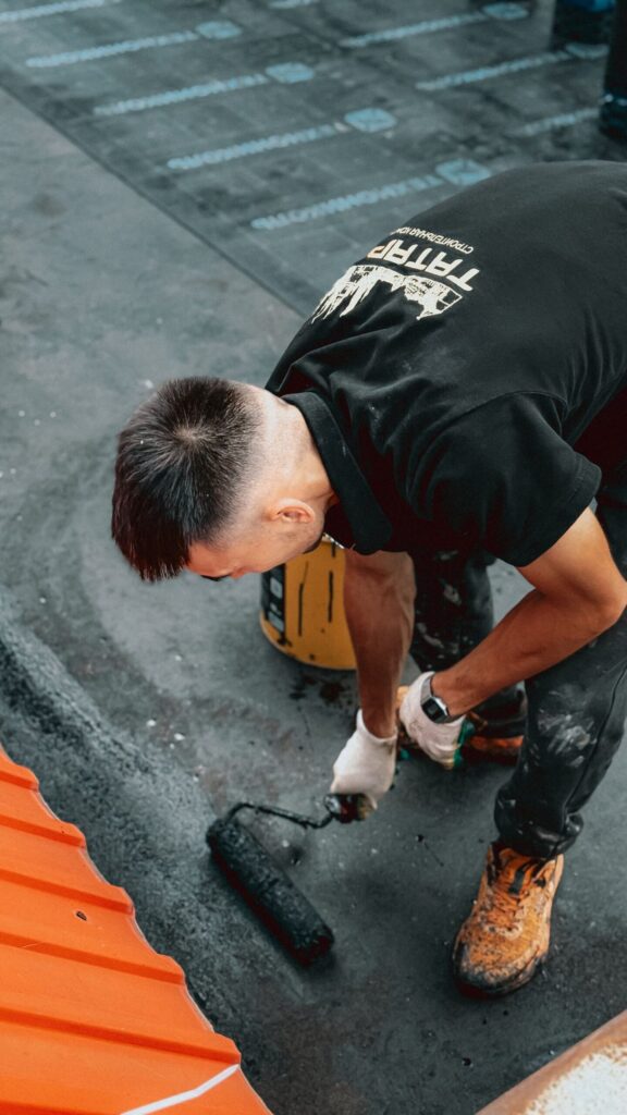 Applying waterproof roof coating